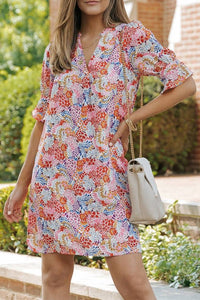 Artistic print- Warm weather dress- Fashion-forward dress- Designer dress- Cotton dress- Trendy design- High-quality dress- Floral motif- Flutter sleeve detail- Boho print- Playful dress- Flowy sleeves- Fashion statement-Striking summer dress- Refreshing summer look- Dress with flair- Show-stopping dress- Dress craftsmanship- Figure-flattering silhouette- Bright summer dress- A-line silhouette- Party dress- Flattering dress-