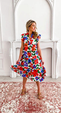 Fashion essential- Dress with flair- Romantic style- Dress elegance- Bright summer dress- Cool summer outfit- Day to night dress- A-line silhouette- Unique dress detail- Cotton dress- Easy to wear- Fashionable attire- Party dress- Breezy dress- Floral motif- Fun-filled moments- Endless style- Dress silhouette- Feminine detail- Romantic dress- Tiered midi dress