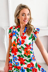 Dress craftsmanship- Fashion essential- Dress with flair- Romantic style- Dress elegance- Bright summer dress- Cool summer outfit- Day to night dress- A-line silhouette- Unique dress detail- Cotton dress- Easy to wear- Fashionable attire- Party dress- Breezy dress- Floral motif- Bold floral elegance- Tiered dress trend- Playful style