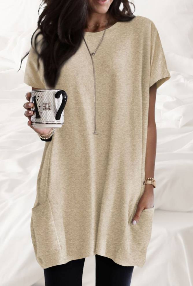 "Fashionable oversized tee with pocket detail" "Roomy t-shirt with pockets for storage" "All-season oversized tee with functional pockets" "Relaxed oversized tee with pocket convenience" "Stylish oversized tee, perfect for layering" "Oversized t-shirt with pockets, available in various colors" "Oversized t-shirt for a comfortable, relaxed look"