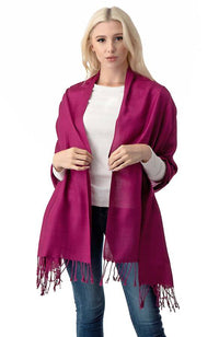 Explore our selection of reversible wraps if you’re looking for maximum versatility. They can be worn just like a traditional oblong scarf, but they also double-up as a shawl for extra protection against the elements