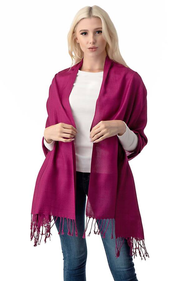 Explore our selection of reversible wraps if you’re looking for maximum versatility. They can be worn just like a traditional oblong scarf, but they also double-up as a shawl for extra protection against the elements