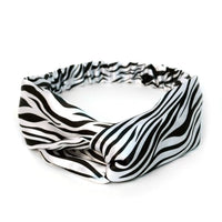 Crisscross Animal Print Summer Headbands Jolie Vaughan | Online Clothing Boutique near Baton Rouge, LA