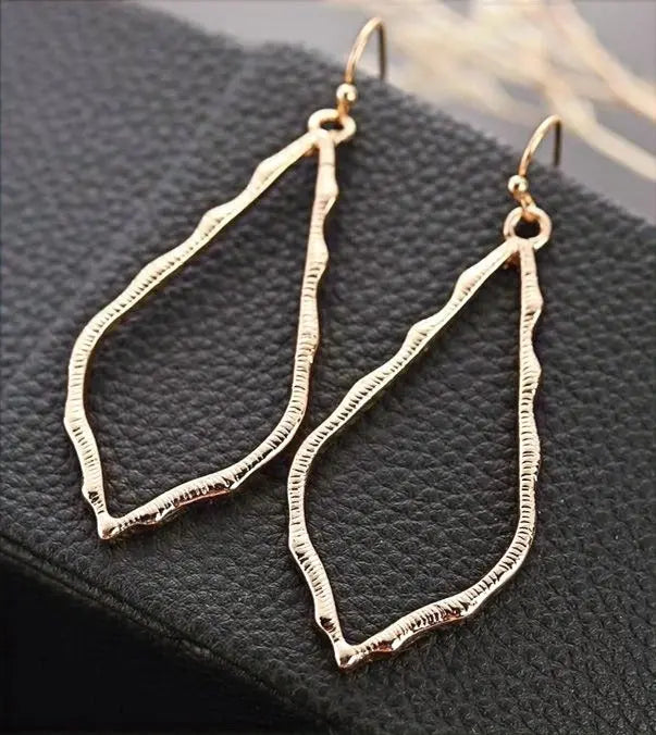 Hollow Waterdrop Dangle Earrings Jolie Vaughan | Online Clothing Boutique near Baton Rouge, LA, kendra scott, fashion designer, designer jewelry, fashion designer jewelry, 14k gold, gold, drop earrings, earrings, moroccan, silhouette, architecture, classic, alexandra, marrakech, marrakech collection, summer, summer 2014, summer collection, sophee, gifts for her, gifts for valentines day, valentines day, gifts for girlfriend, galentine gifts, kendra scott