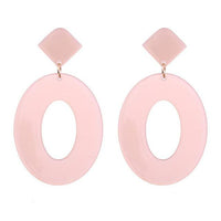 Double the cuteness! Two brilliant transparent pink resin drop earrings made in a gorgeously retro cutout teardrop shape and attached to a traditional stud. Only while supplies last.