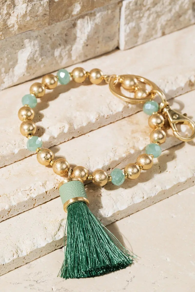 Shimmer and Gold Tassel Key Ring Bracelet Jolie Vaughan | Online Clothing Boutique near Baton Rouge, LA