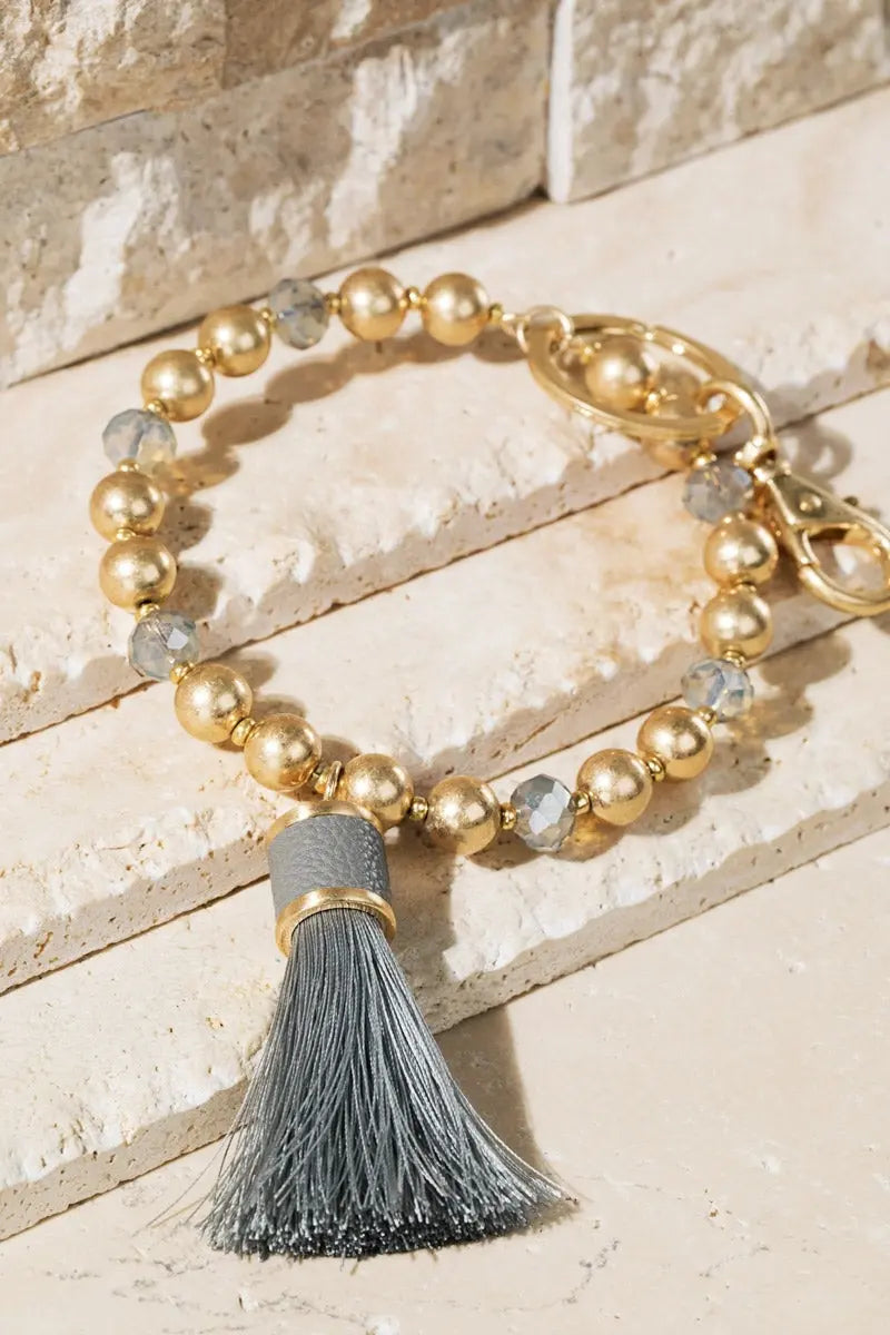 Shimmer and Gold Tassel Key Ring Bracelet Jolie Vaughan | Online Clothing Boutique near Baton Rouge, LA
