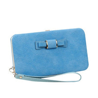This wallet is the perfect choice for women who want to keep their essentials organized and secure. The six credit card slots, ID display window, and zipper pocket make it easy to store cards, cash, and other small items. The wrist strap provides a convenient way to carry the wallet, and the phone space makes it easy to keep your phone close at hand.