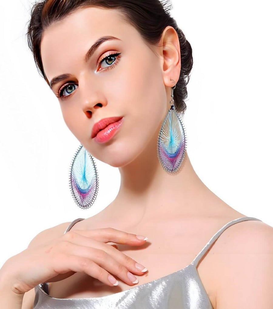 Beautiful hand coiled & handwoven Peacock Colored String art Earrings