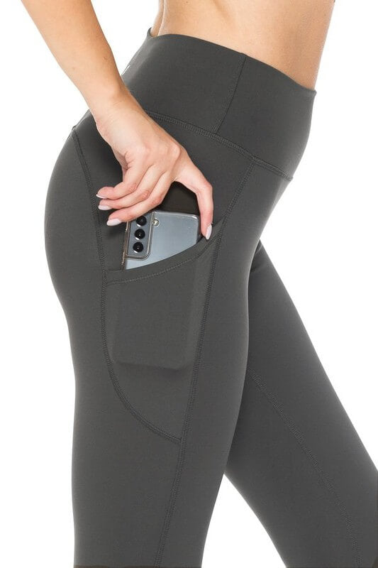 Leggings with mobile outlet phone pocket