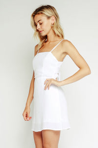 Best of all, the beautiful orange color makes you feel like you're glowing from within. It's also lightweight and flowy, making it perfect for hot summer days. Plus, it's lined so you don't have to worry about it being sheer.