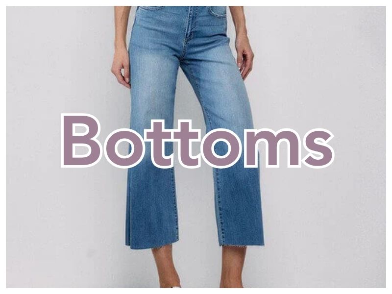 Shop Women's Bottoms | Jolie Vaughan Boutique [Image Description - a woman wearing wide leg crop jeans with the text "Bottoms" written over top.]
