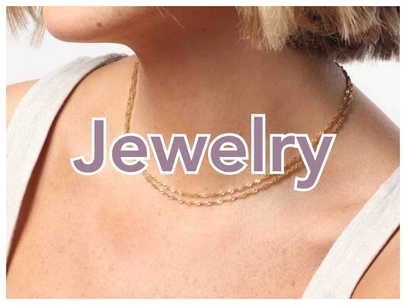 Shop Women's Jewelry | Jolie Vaughan Boutique [Image Description - a woman wearing a gold double helix chain necklace with the text "Jewelry" written over top.]