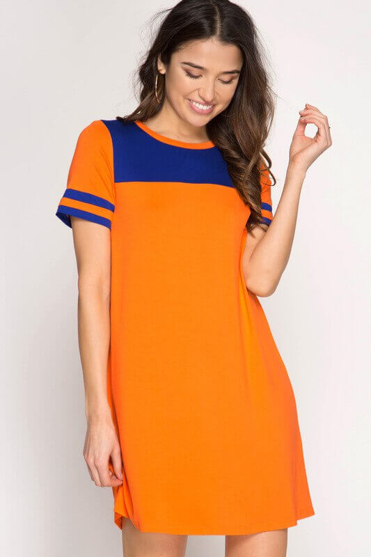 Chiffon orange printed halter tiered dress for women by Mandira Wirk