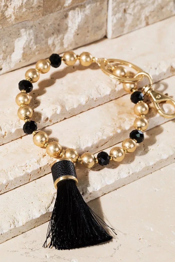 Shimmer and Gold Tassel Key Ring Bracelet Jolie Vaughan | Online Clothing Boutique near Baton Rouge, LA