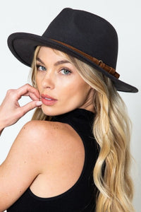 Wide Brim Fashion Hat with Buckle Detail - Jolie Vaughan | Online Clothing Boutique near Baton Rouge, LA The Wide Brim Fedora with buckles detail is a fashionable, wide brimmed hat that will keep you looking classy. You can wear this in any season and it goes well with a dress or pants. The fedora is made of wool felt which provides good protection from the sun while still keeping your head cool.