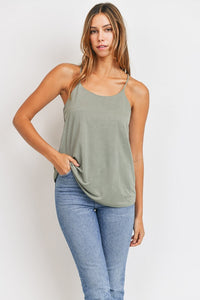 You have got options: Wear this top long and loose while you flow, french tuck, or tie it back for a sportier look. Just throw in the wash and dry without a second thought. Ladies Perfect Strap Tank Top 95% Poly, 5% Spandex Made in the USA