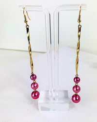 statement earrings- leather tassel earrings- Baublebar- purple tassel earrings- hot pink tassel earrings- tassel earrings for women- yarn earrings- clip on tassel earrings- green tassel earrings- pink tassel earrings